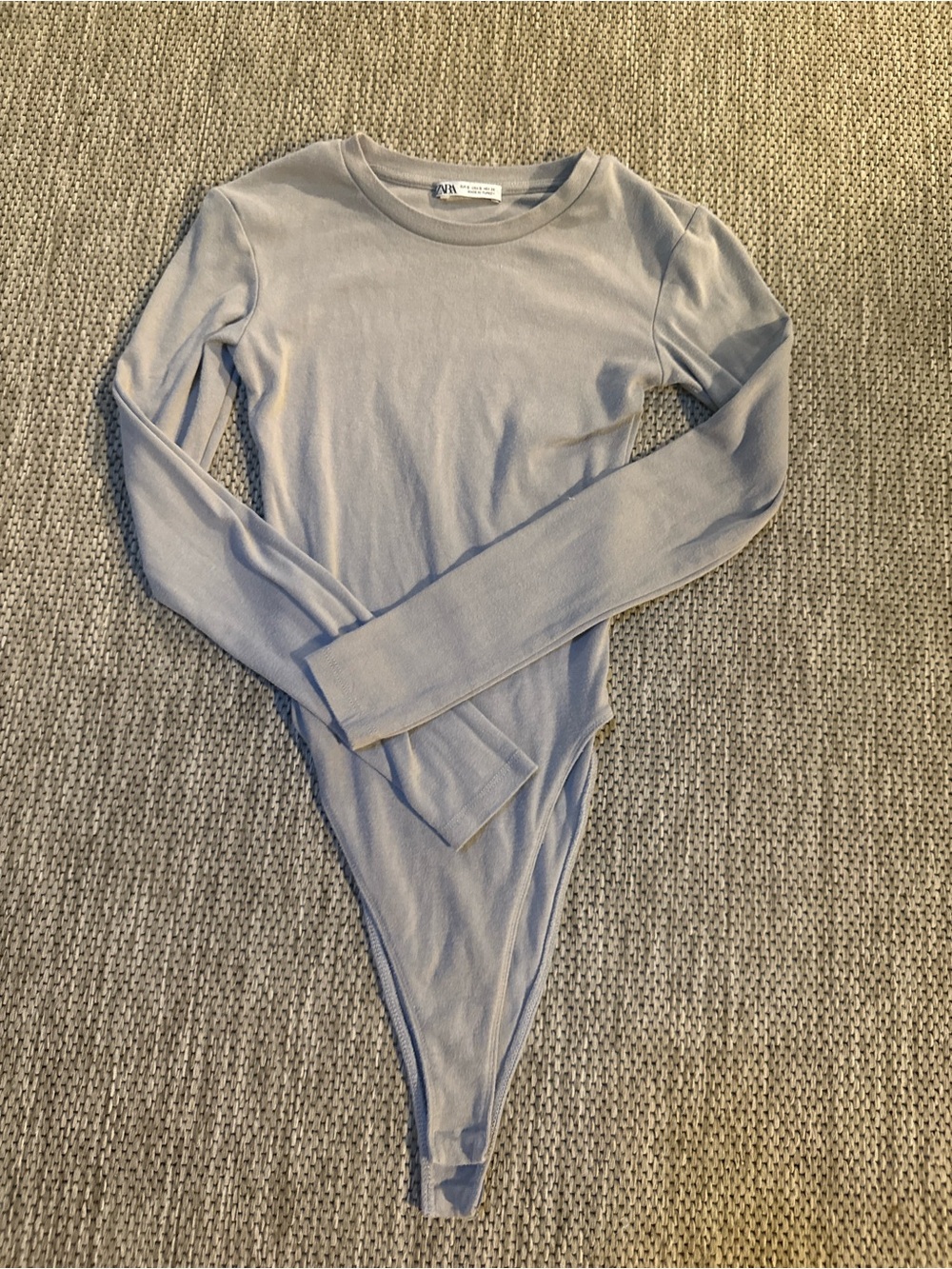 Womenโs Long-Sleeve One-Piece Bodysuit in Light gray
